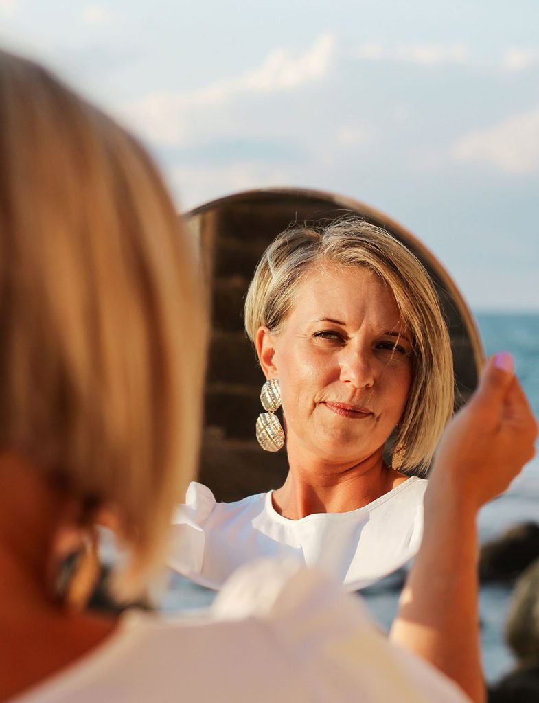 Woman considering weight management and wellbeing